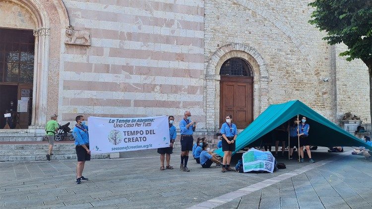 The young people of Agesci, Italy, set up their tent in front of Assisi's Basilica of St. Clare
