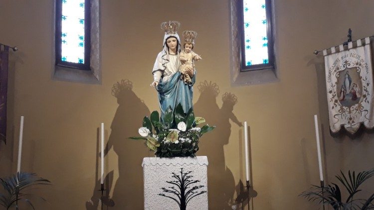 The statue of Our Lady inside the church