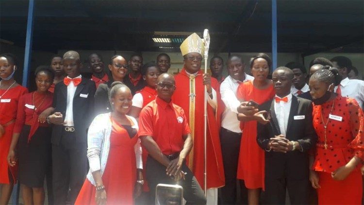 Bishop Valentine Kalumba, OMI, of Livingstone. Diocese, Zambia surrounded by young people after confirmation.