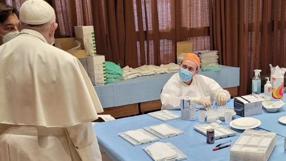 Pope Francis observes process for giving vaccinations