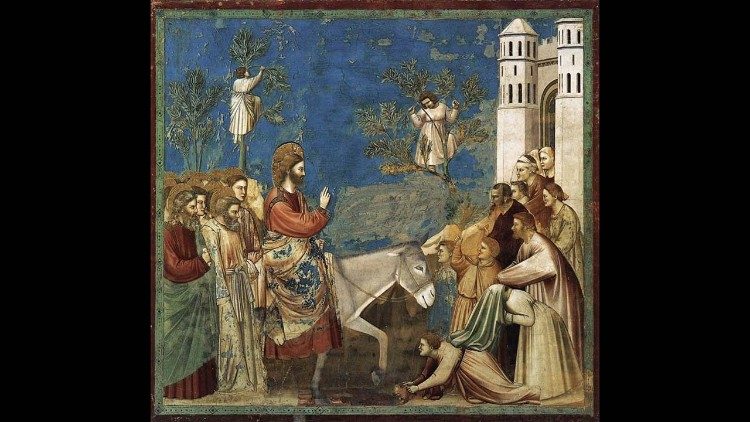 Entrada de Jesús en Jerusalén en el lomo de un burro.