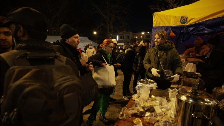 Staff and volunteers of Malteser International provide assistance to refugees passing though Lviv