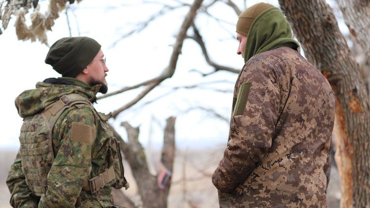 Fr. Zelinskyy with a serviceman of the Ukrainian military