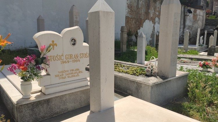 The graves in a Muslim cemetary show the ages of the victims of the war