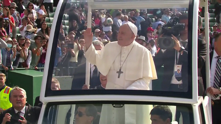 Pope Francis arrives at the stadium for the Mass