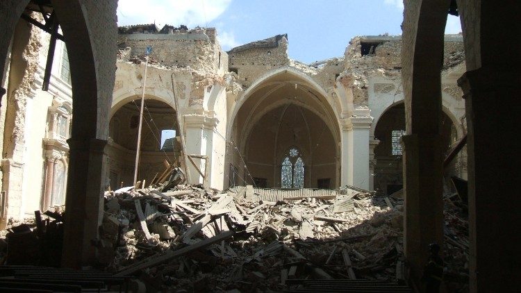 File photo of the ruins of Basilica of Collemaggio in L'Aquila after the 2009 quake