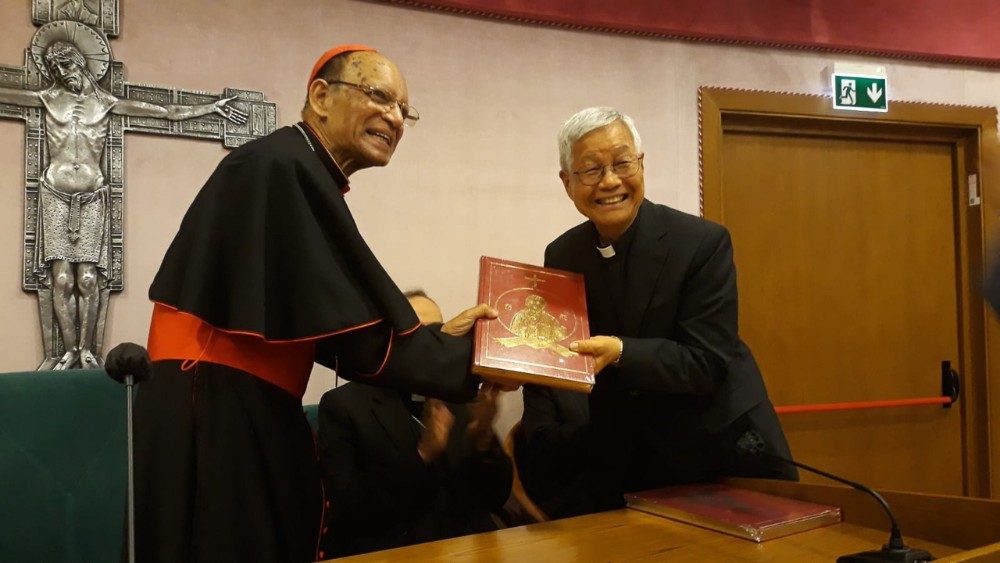 Cardinal Oswald Gracias offers newly-published Book of the Gospels to new Cardinal Lazarus You Heung-sik