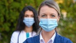 selective-focus-shot-doctors-wearing-face-masks-outdoors.jpg