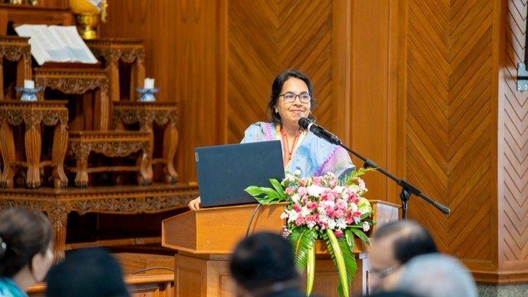 Rita Roseline Costa reports for her group to the Assembly