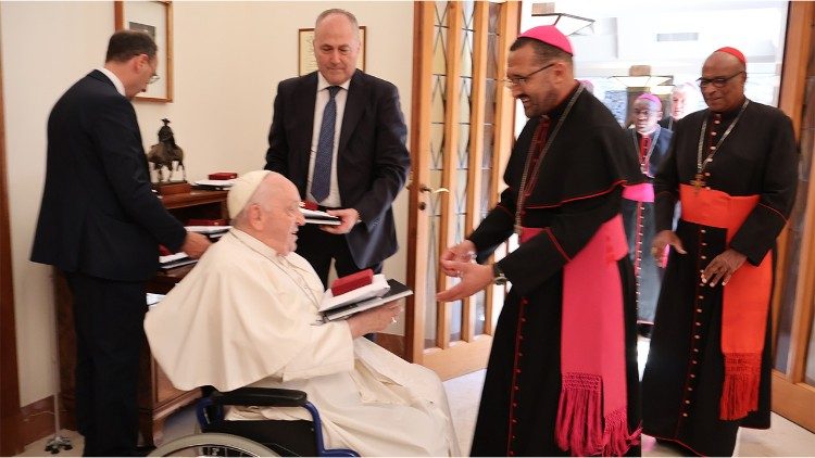 Ad limina visit: MAP Francis handing gifts to Bishop Sipuka.