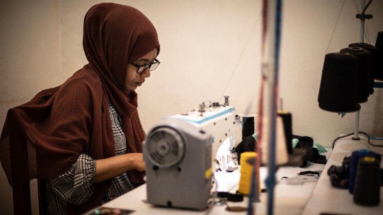 Jamila, a refugee from Yemen, now one of the owners of the Zoma Bonnet textile micro-enterprise in Addis Ababa. Photo by Giovanni Culmone / Gsf
