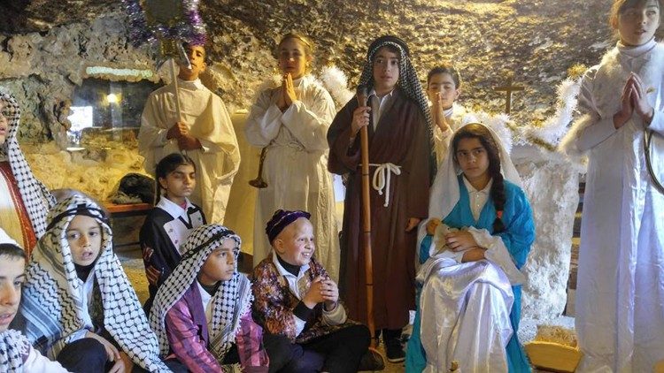 Durante la Messa di Natale al centro Holy Child Program